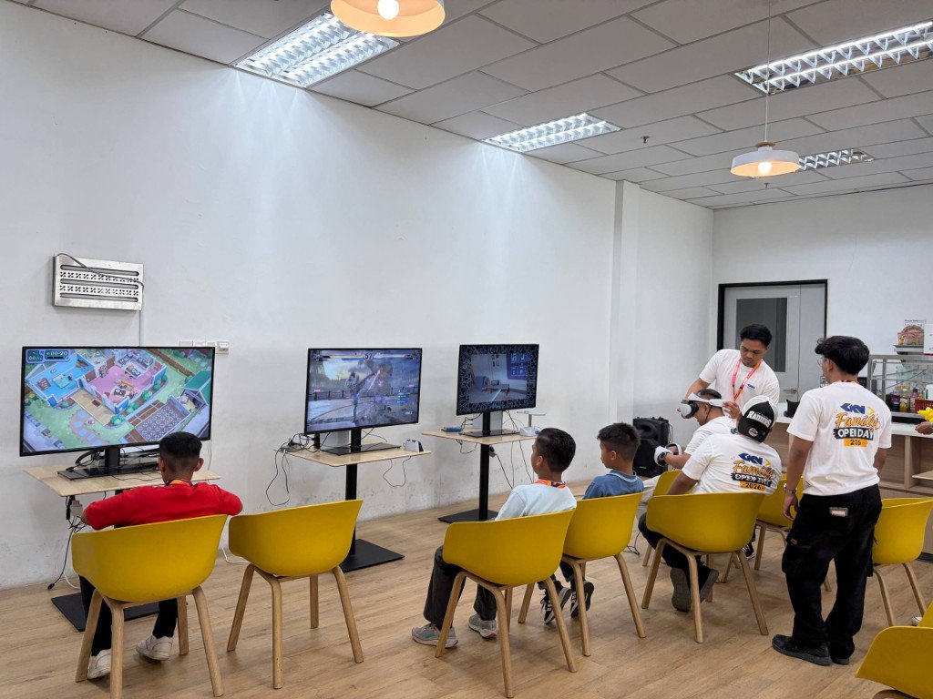 Several PlayStation 5 stations at an event